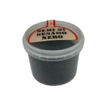 Barattolo di semi di sesamo nero croccanti e nutrienti retro