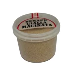Barattolo di senape gialla macinata dal colore dorato