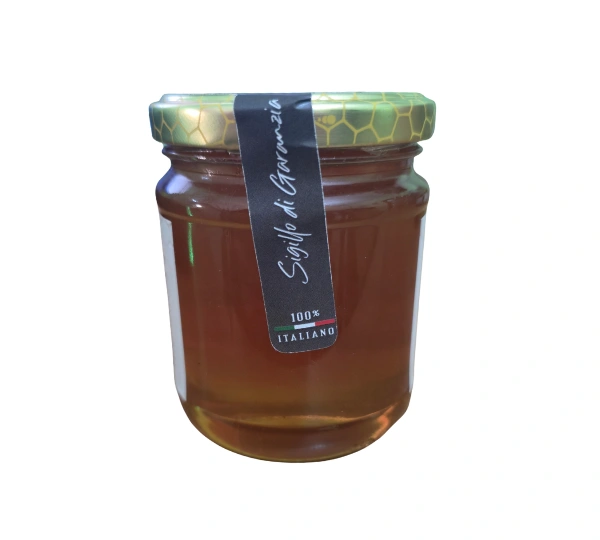 Sigillo nero “100% Italiano” sul vasetto di Miele Millefiori